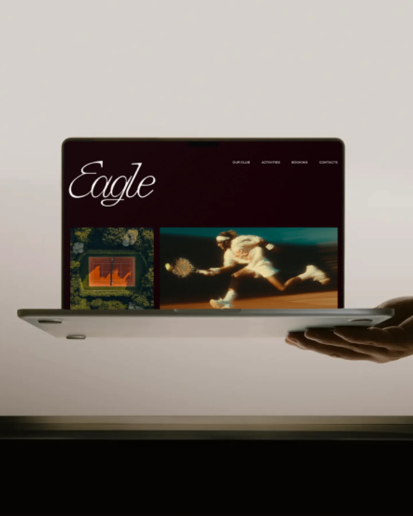 Eagle tennis club website displayed on a laptop.