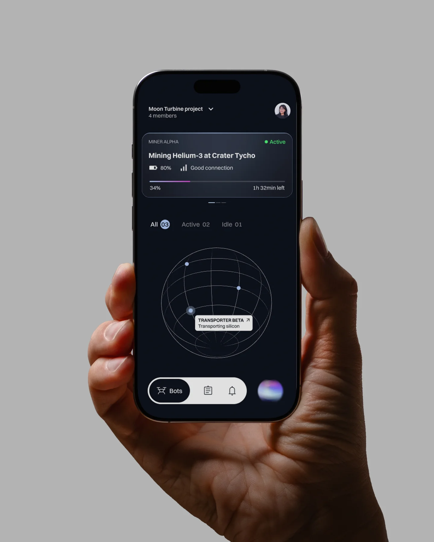 A hand holding a phone displaying Nexa’s robot map and controls.
