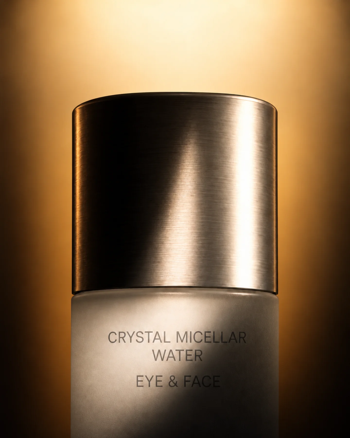 Close-up of a Crystal Micellar Water bottle with a metallic cap.