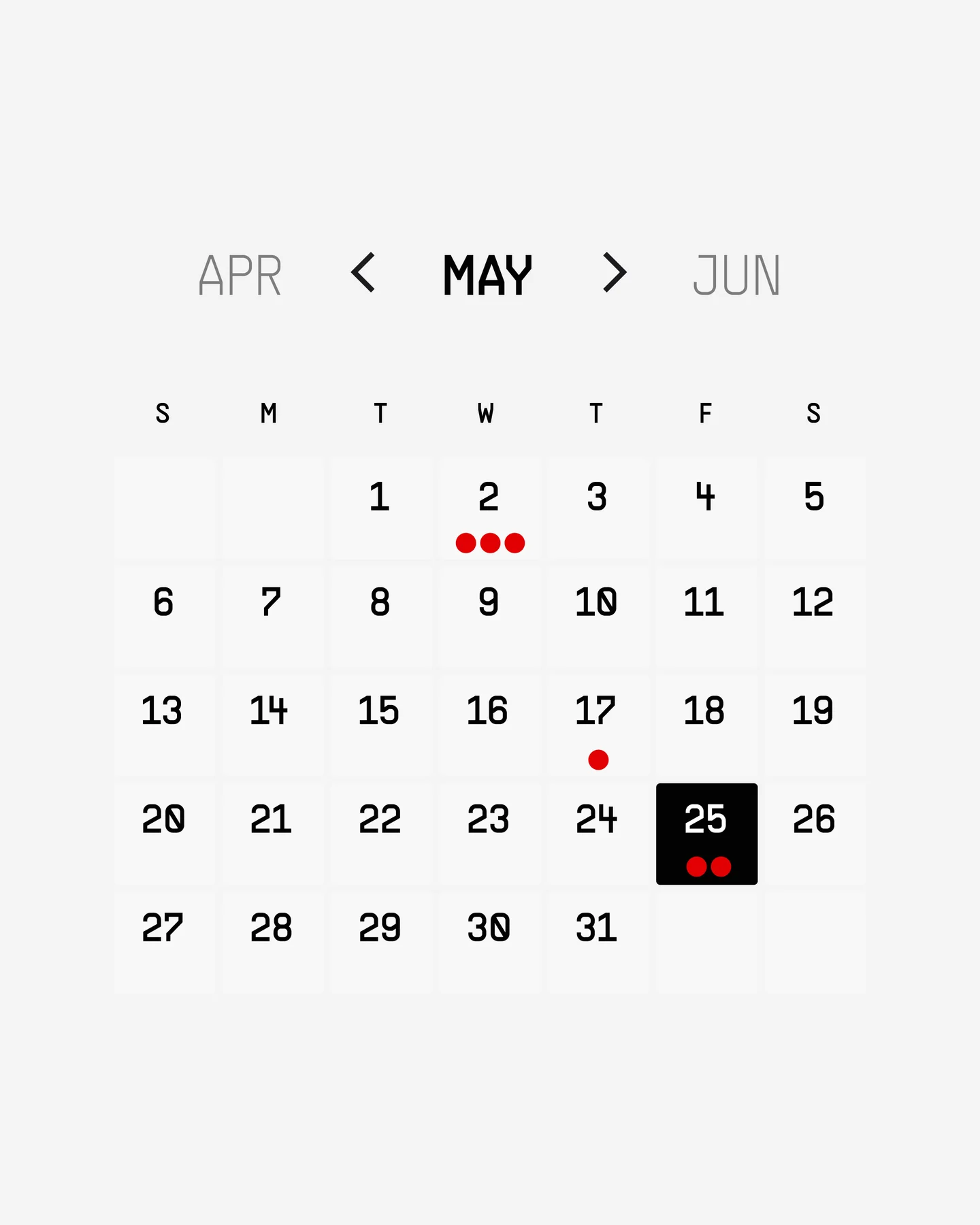 Healthtech calendar interface displayed on a tilted phone over an orange surface.
