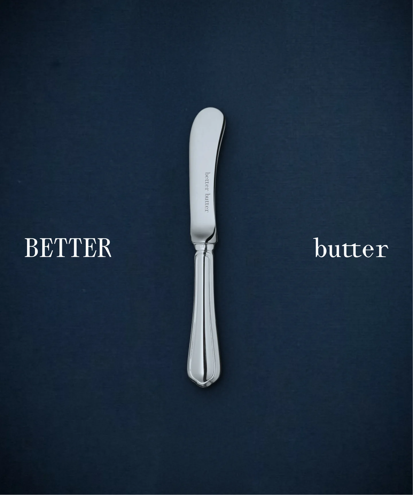 Butter knife on a dark blue background between Better and butter lettering.